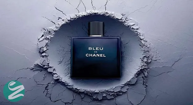 Bleu de Chanel perfume bottle on cracked textured blue background